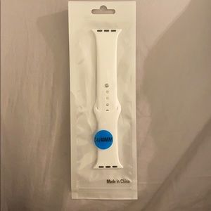 White Apple Watch band.